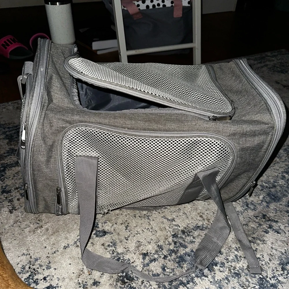 Airport approved pet carrier. Carries up to 50lbs.